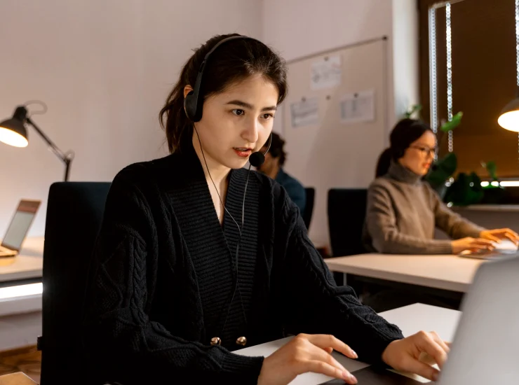 Production manager coordinating on headset